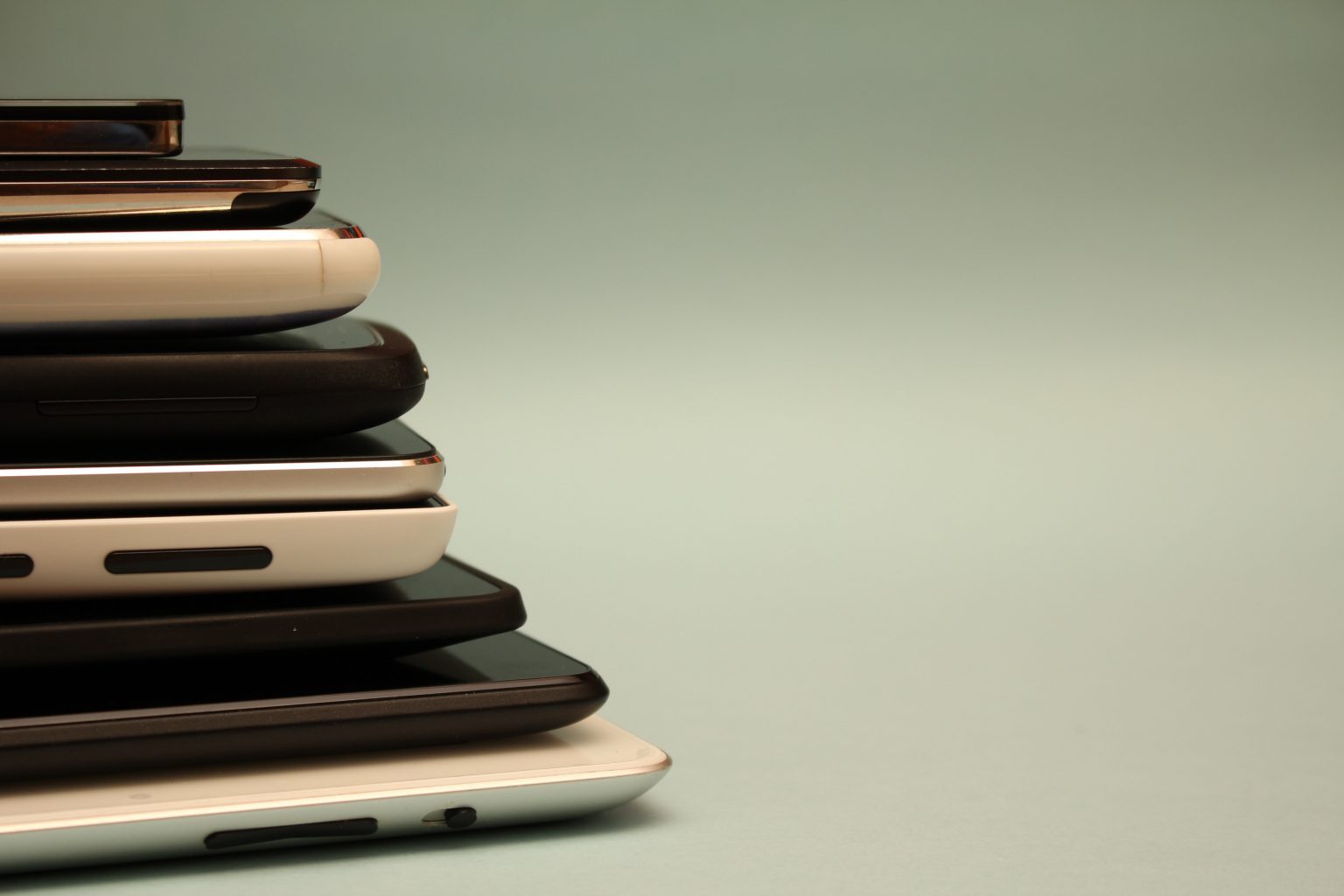 Image of a stack of mobile phones.