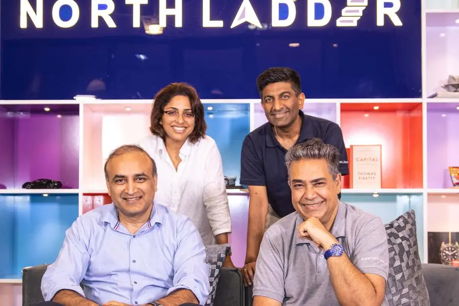 NorthLadder co-founders Sandeep Shetty, Mihin Shah, Neha Kalra, and Pishu Ganglani in front of the company logo wall.