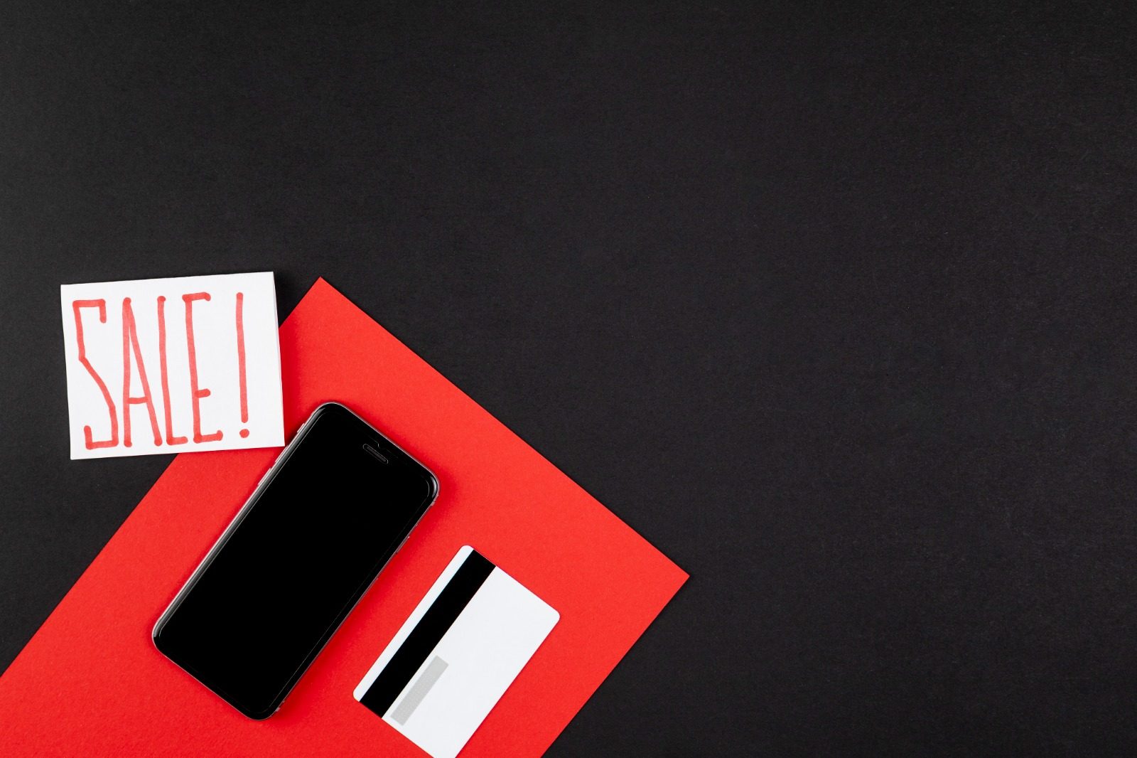 Phone on a red and black background